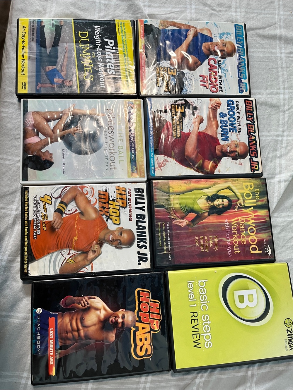 Mixed Home Fitness DVD Collection – Assorted Colors – Various Brands